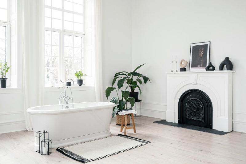 Bathtub with fireplace.