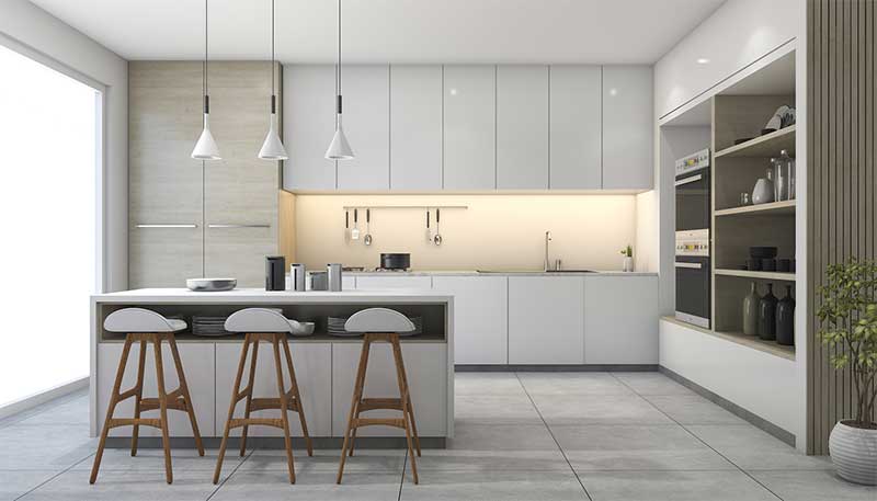 Modern kitchen with stools at island.