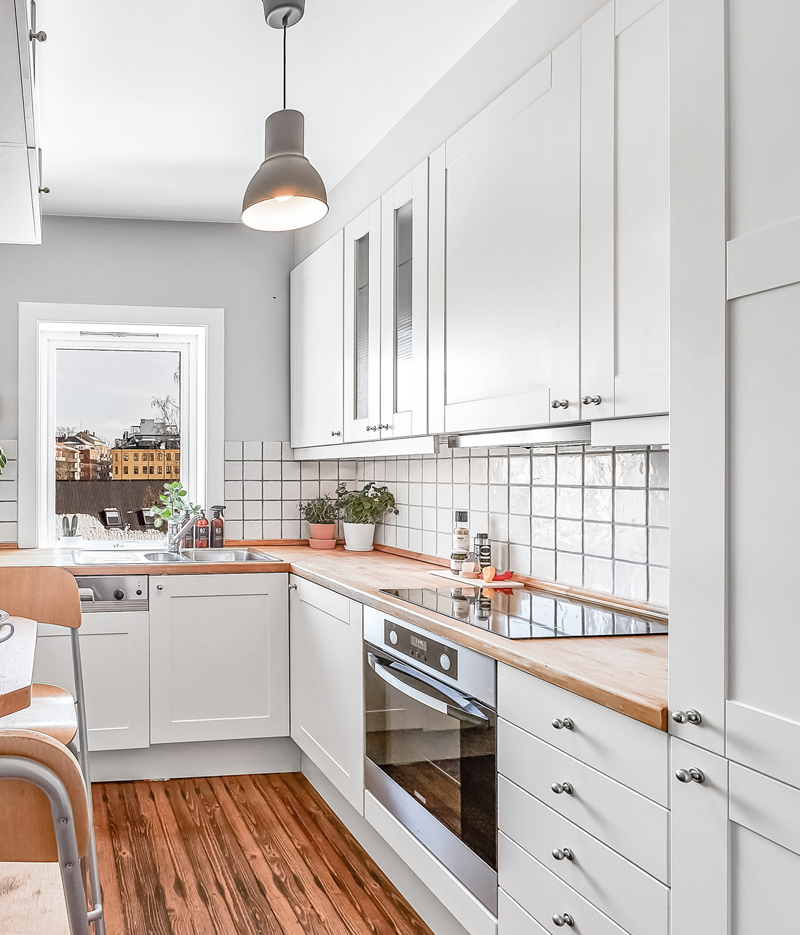 Kitchen with subway tile.